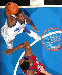 T-Mac Soars Above The Rim For The Dunk